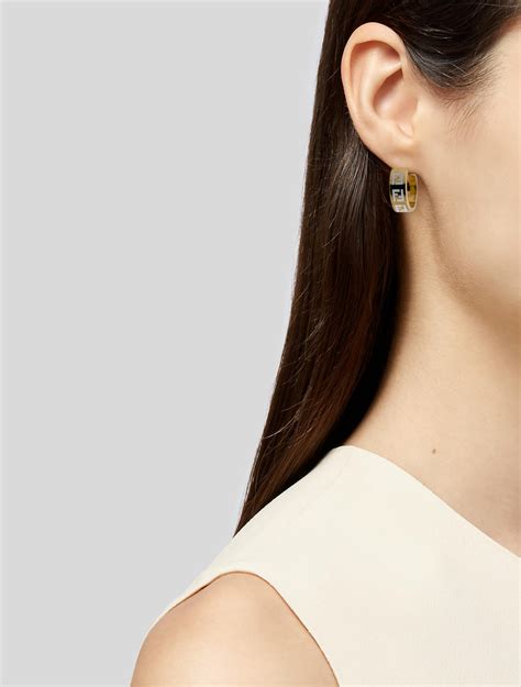 Forever Fendi earrings .